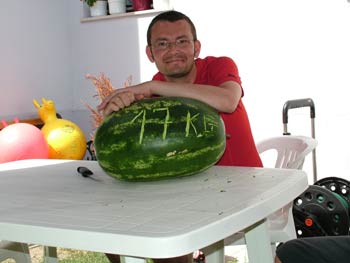 Milan with a giant water melon